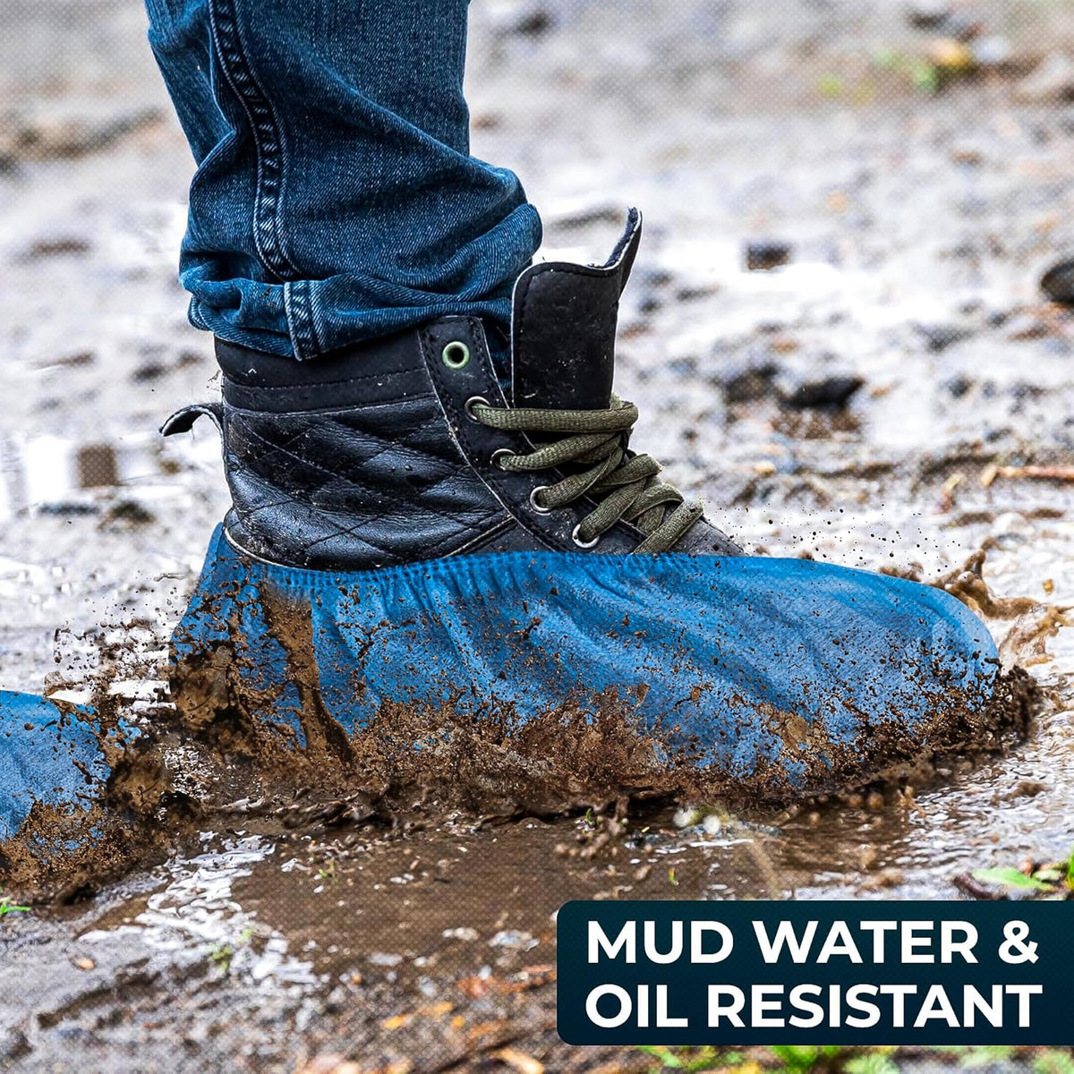 Blue shoe covers over work boots on a muddy floor